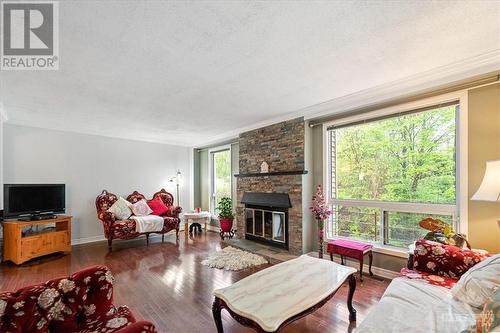 1133 Des Forets Avenue, Ottawa, ON - Indoor Photo Showing Living Room With Fireplace