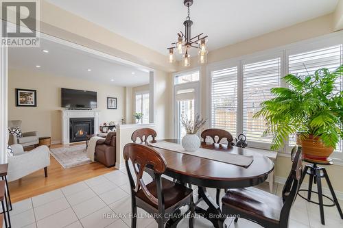 35 Michaelis Street, New Tecumseth, ON - Indoor Photo Showing Dining Room With Fireplace