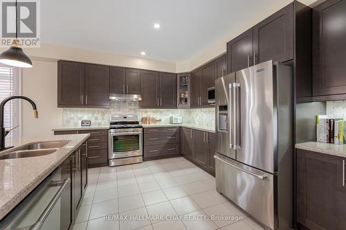 35 Michaelis Street, New Tecumseth, ON - Indoor Photo Showing Kitchen With Double Sink