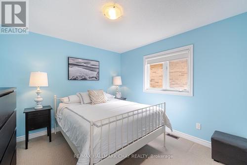 35 Michaelis Street, New Tecumseth, ON - Indoor Photo Showing Bedroom