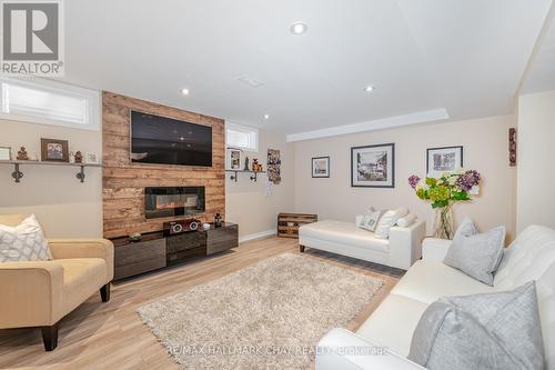 35 Michaelis Street, New Tecumseth, ON - Indoor Photo Showing Living Room With Fireplace