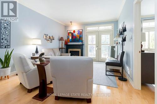 8 Carmichael Trail, Hamilton, ON - Indoor Photo Showing Living Room With Fireplace