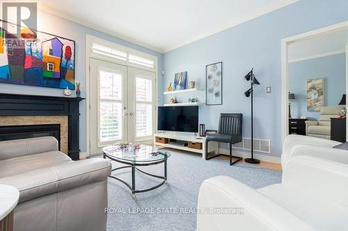 8 Carmichael Trail, Hamilton, ON - Indoor Photo Showing Living Room With Fireplace