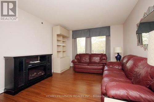 2405 - 100 Burloak Drive, Burlington, ON - Indoor Photo Showing Living Room With Fireplace