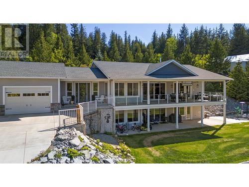 2030 Canoe Beach Drive Ne, Salmon Arm, BC - Outdoor With Deck Patio Veranda With Facade