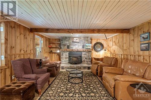 4370 Lords Mills Road, Prescott, ON - Indoor Photo Showing Living Room With Fireplace