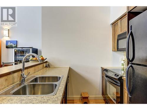 1331 Ellis Street Unit# 406, Kelowna, BC - Indoor Photo Showing Kitchen With Double Sink