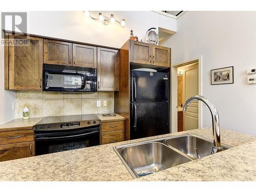 1331 Ellis Street Unit# 406, Kelowna, BC - Indoor Photo Showing Kitchen With Double Sink