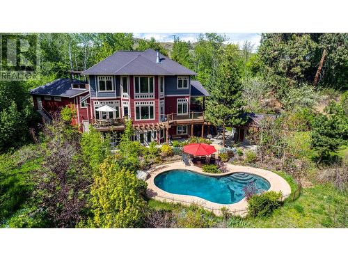10830 Kalamalka Road, Coldstream, BC - Outdoor With In Ground Pool With Deck Patio Veranda