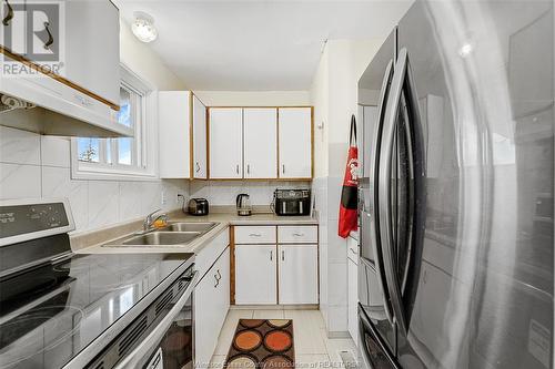 1615 Curry, Windsor, ON - Indoor Photo Showing Kitchen With Double Sink