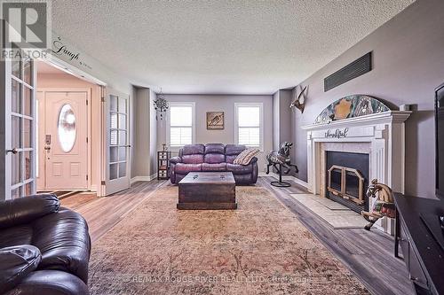 6 Greenwood Crescent, Kawartha Lakes, ON - Indoor Photo Showing Living Room With Fireplace