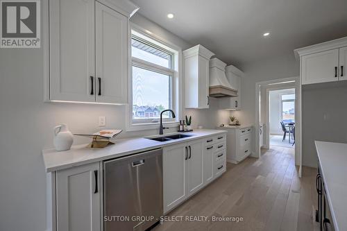 17 Spruce Crescent, North Middlesex, ON - Indoor Photo Showing Kitchen With Double Sink