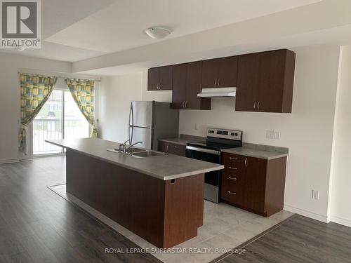 22 Village Gate Drive, Wasaga Beach, ON - Indoor Photo Showing Kitchen With Double Sink