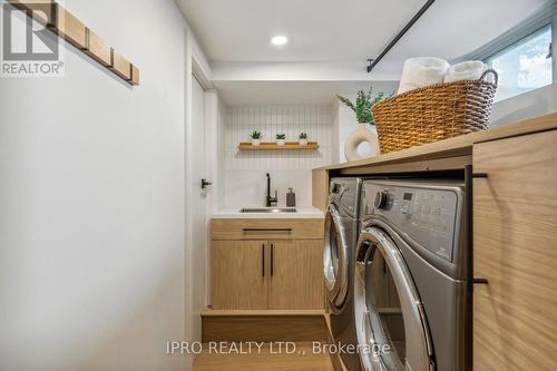 141 O'Connor Drive, Toronto, ON - Indoor Photo Showing Laundry Room