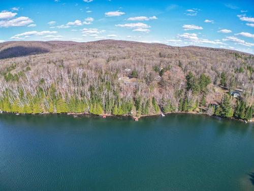 Photo aÃ©rienne - 34 Ch. Du Lac-Fawn E., Harrington, QC - Outdoor With Body Of Water With View