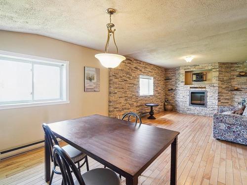 Common room - 65 Rue Ste-Anne, L'Épiphanie, QC - Indoor Photo Showing Other Room With Fireplace