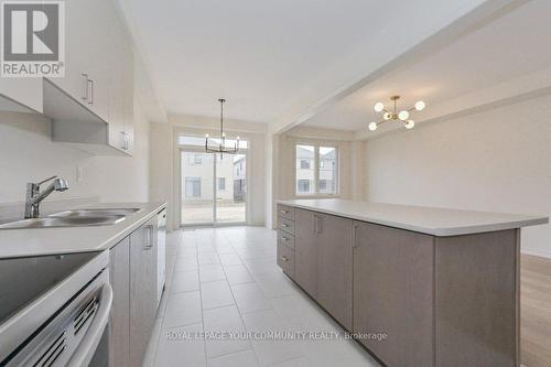 95 Gauley Drive, Centre Wellington, ON - Indoor Photo Showing Kitchen With Double Sink