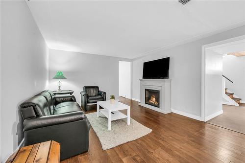 142 Normanhurst Avenue, Hamilton, ON - Indoor Photo Showing Living Room With Fireplace
