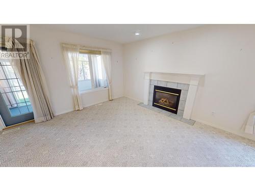 1401 Willowbrook  Drive Unit# 62, Cranbrook, BC - Indoor With Fireplace