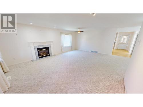 1401 Willowbrook  Drive Unit# 62, Cranbrook, BC - Indoor With Fireplace