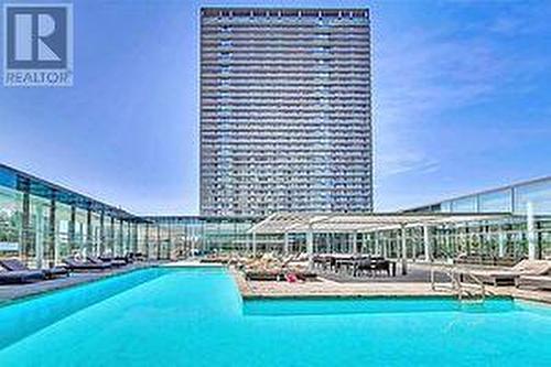 902 - 105 The Queensway, Toronto, ON - Outdoor With In Ground Pool