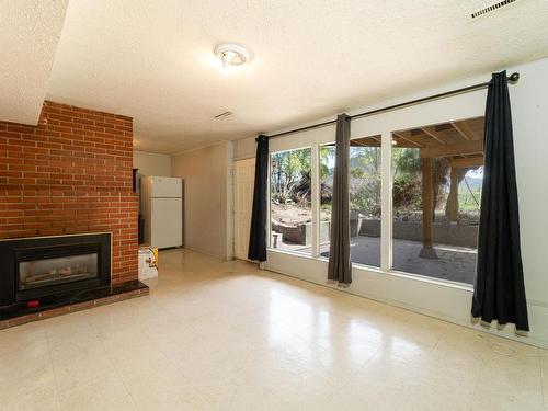 325 Schubert Drive, Kamloops, BC - Indoor Photo Showing Other Room With Fireplace