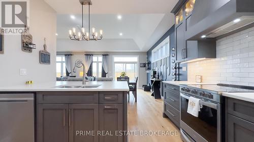 303 Hazelton Lane, South Huron (Exeter), ON - Indoor Photo Showing Kitchen With Double Sink With Upgraded Kitchen