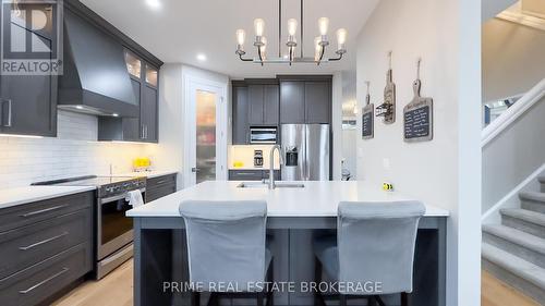 303 Hazelton Lane, South Huron (Exeter), ON - Indoor Photo Showing Kitchen With Upgraded Kitchen