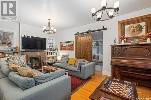 710 University Drive, Saskatoon, SK - Indoor Photo Showing Living Room With Fireplace