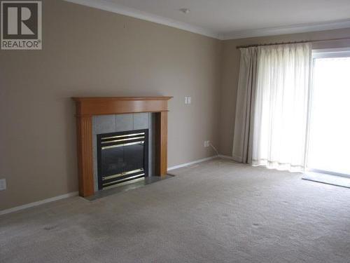 56 500 Wotzke Drive, Williams Lake, BC - Indoor Photo Showing Living Room With Fireplace