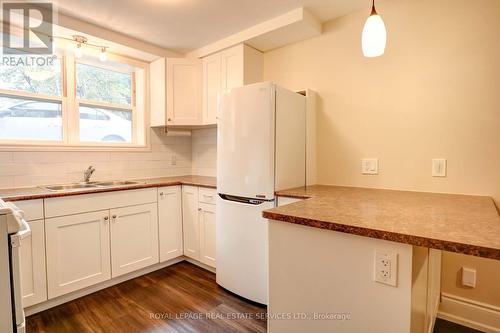 #1 - 61 Third Street, Toronto, ON - Indoor Photo Showing Kitchen With Double Sink