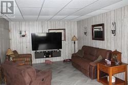 family room with newer pellet stove. - 