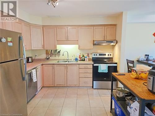 689 Star Flower Avenue Unit# B, Waterloo, ON - Indoor Photo Showing Kitchen With Double Sink