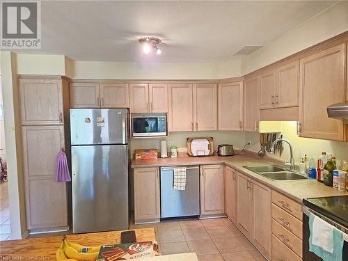 689 Star Flower Avenue Unit# B, Waterloo, ON - Indoor Photo Showing Kitchen With Double Sink