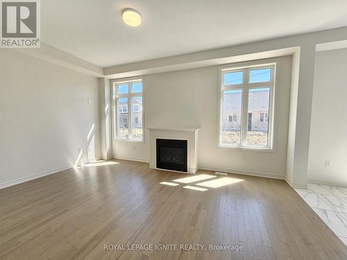 28 Bayberry Drive, Adjala-Tosorontio, ON - Indoor Photo Showing Living Room With Fireplace