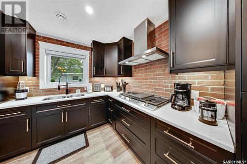 1003 Osler Street, Saskatoon, SK - Indoor Photo Showing Kitchen With Double Sink