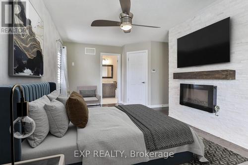 2256 Greening Lane, Burlington, ON - Indoor Photo Showing Bedroom With Fireplace