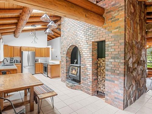 2882 Airport Way, Revelstoke, BC - Indoor With Fireplace