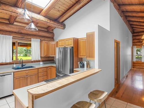 2882 Airport Way, Revelstoke, BC - Indoor Photo Showing Kitchen With Double Sink