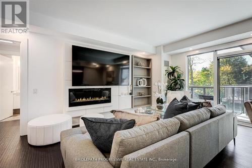 401 - 3 Southvale Drive, Toronto (Leaside), ON - Indoor Photo Showing Living Room With Fireplace