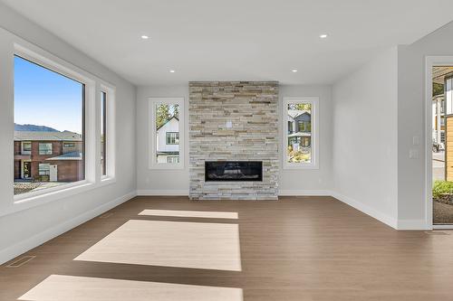 1054 Oak Barrel Place, West Kelowna, BC - Indoor Photo Showing Living Room With Fireplace