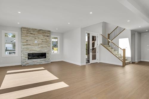 1054 Oak Barrel Place, West Kelowna, BC - Indoor Photo Showing Living Room With Fireplace