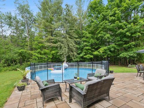 Pool - 1 Ch. Des Perdrix, L'Ange-Gardien, QC - Outdoor With Above Ground Pool With Backyard