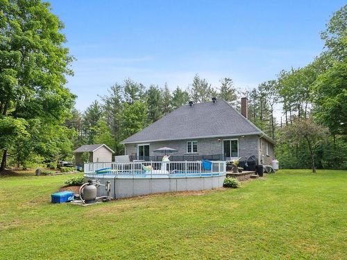 Backyard - 1 Ch. Des Perdrix, L'Ange-Gardien, QC - Outdoor With Above Ground Pool With Backyard