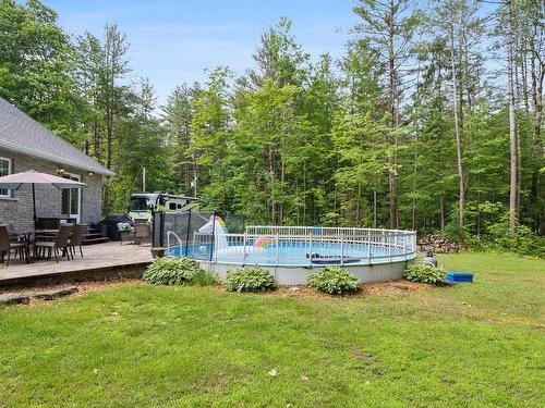 Backyard - 1 Ch. Des Perdrix, L'Ange-Gardien, QC - Outdoor With Above Ground Pool
