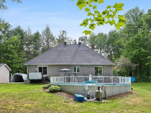 Backyard - 1 Ch. Des Perdrix, L'Ange-Gardien, QC - Outdoor With Above Ground Pool With Backyard