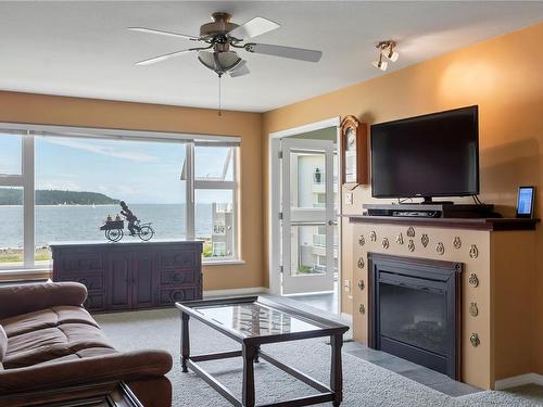 312-350 Island Hwy South, Campbell River, BC - Indoor Photo Showing Living Room With Fireplace