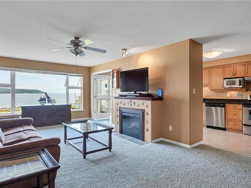 312-350 Island Hwy South, Campbell River, BC - Indoor Photo Showing Living Room With Fireplace