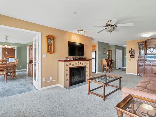 312-350 Island Hwy South, Campbell River, BC - Indoor Photo Showing Living Room With Fireplace