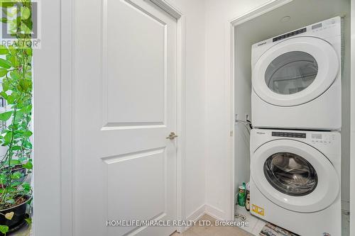 3020 - 8 Nahani Way, Mississauga, ON - Indoor Photo Showing Laundry Room